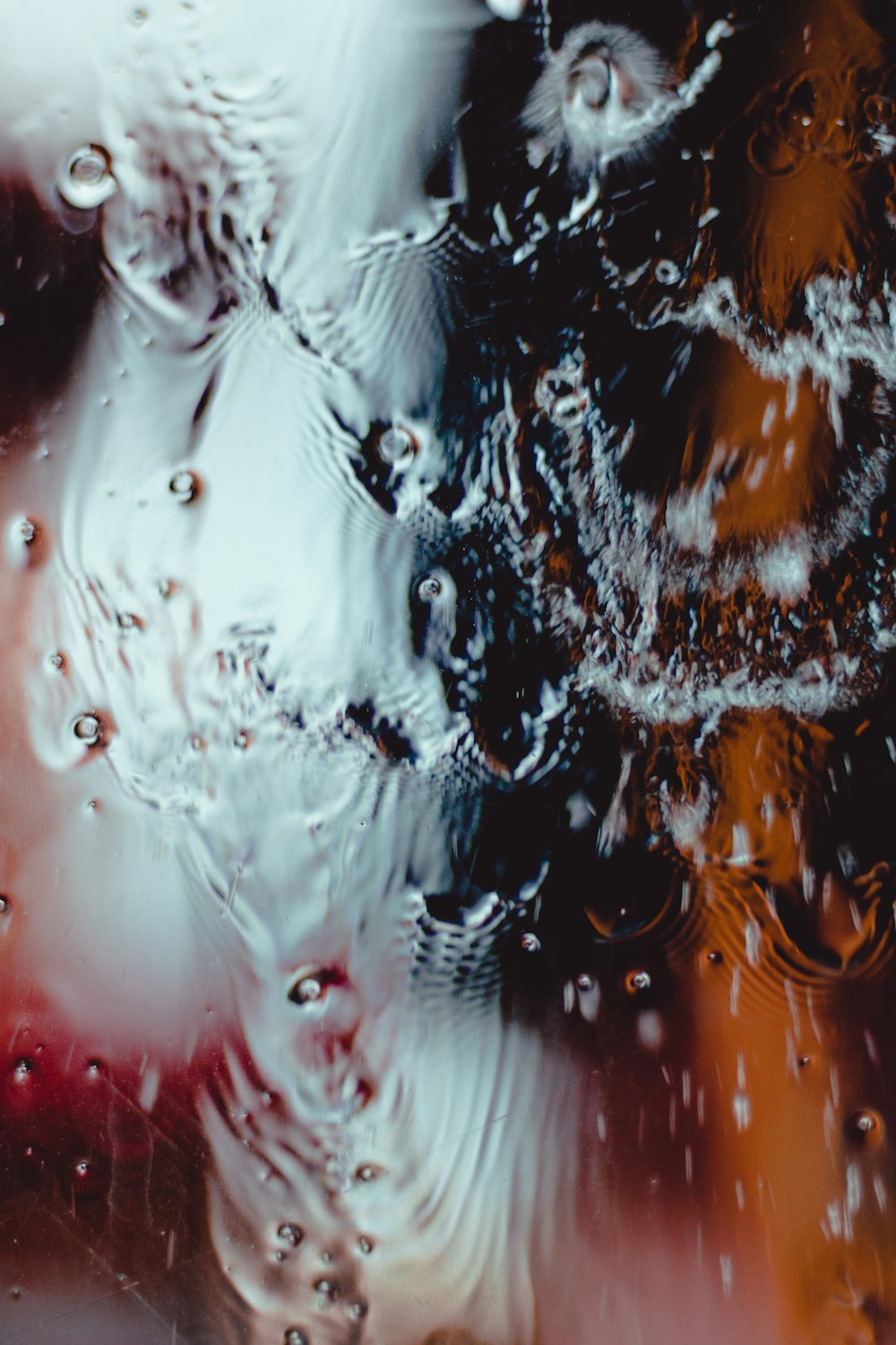 a close up of water droplets on a window