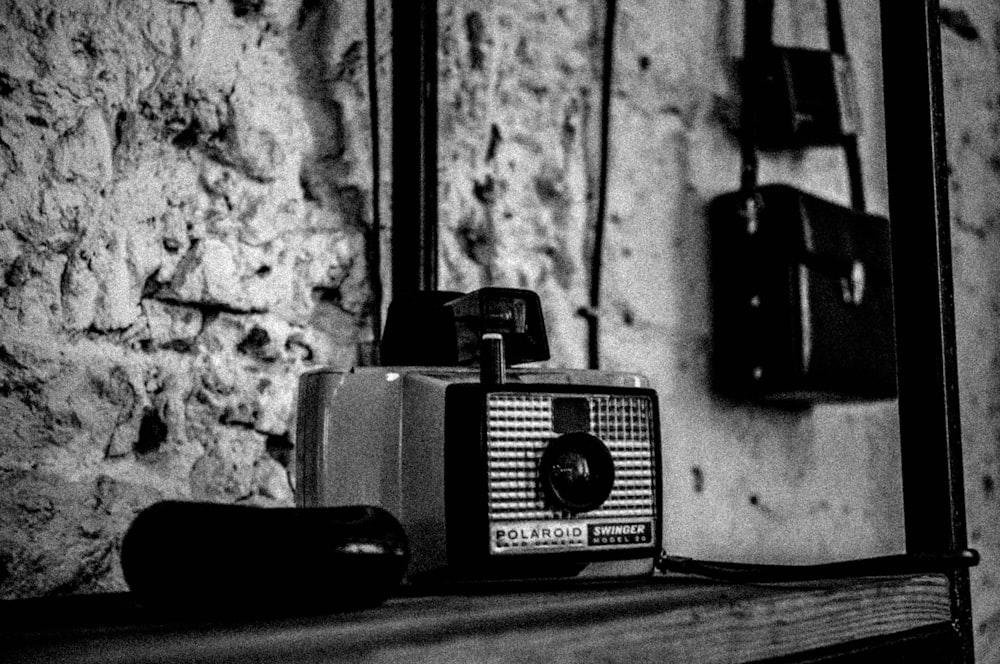 a black and white photo of an old fashioned radio