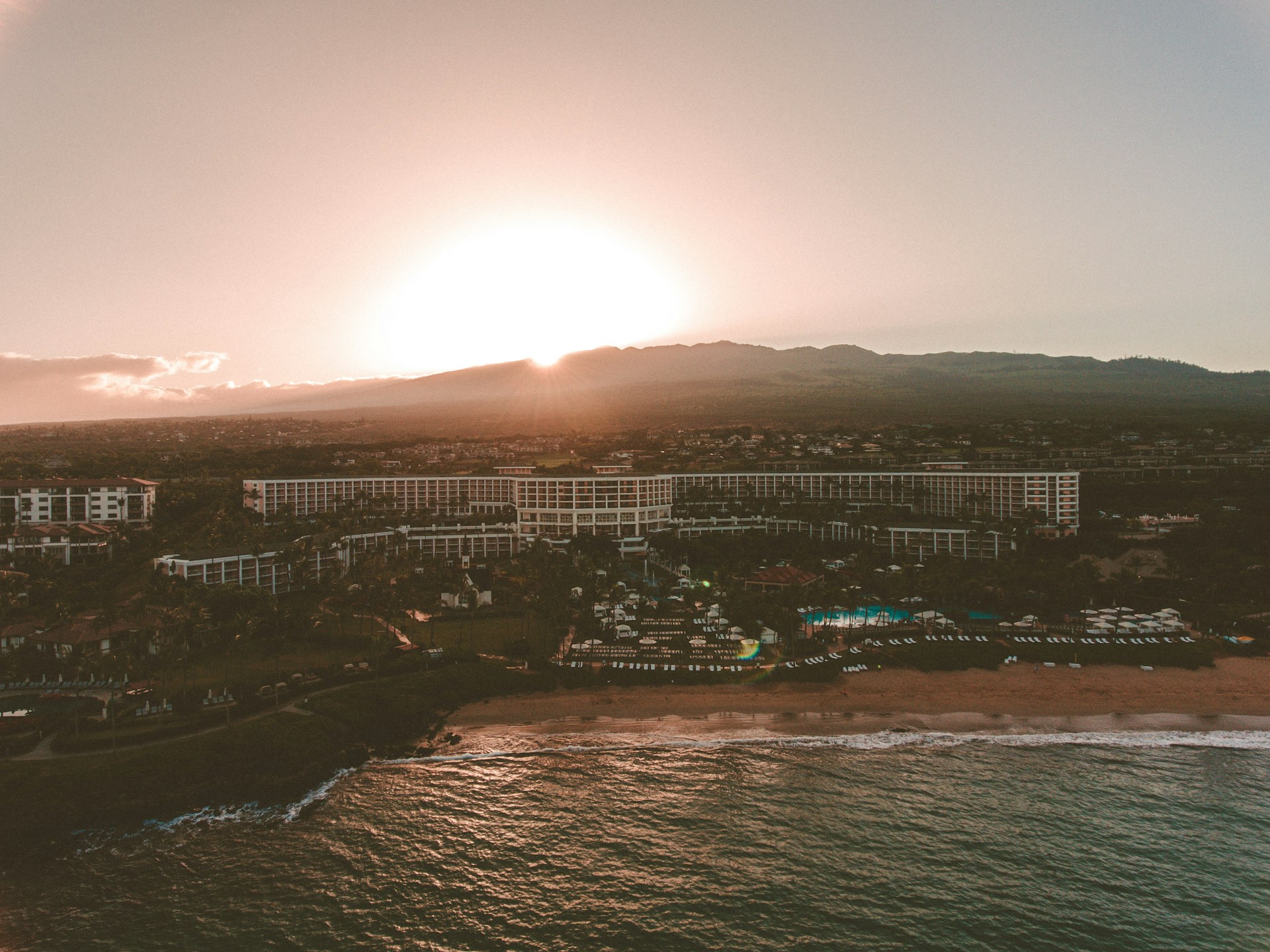 woman wearing yellow long-sleeved dress under white clouds and blue sky during daytime