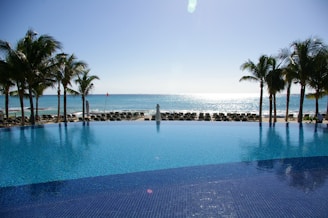 A serene beachfront property with minimalist design overlooking turquoise waters in Riviera Maya.