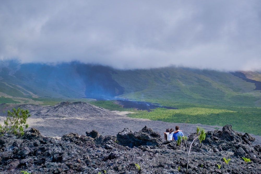 people near mountain during daytime