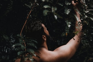 man in forest at night