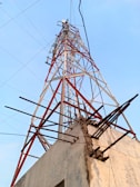 Engineers inspecting structural elements of a newly built communication tower.