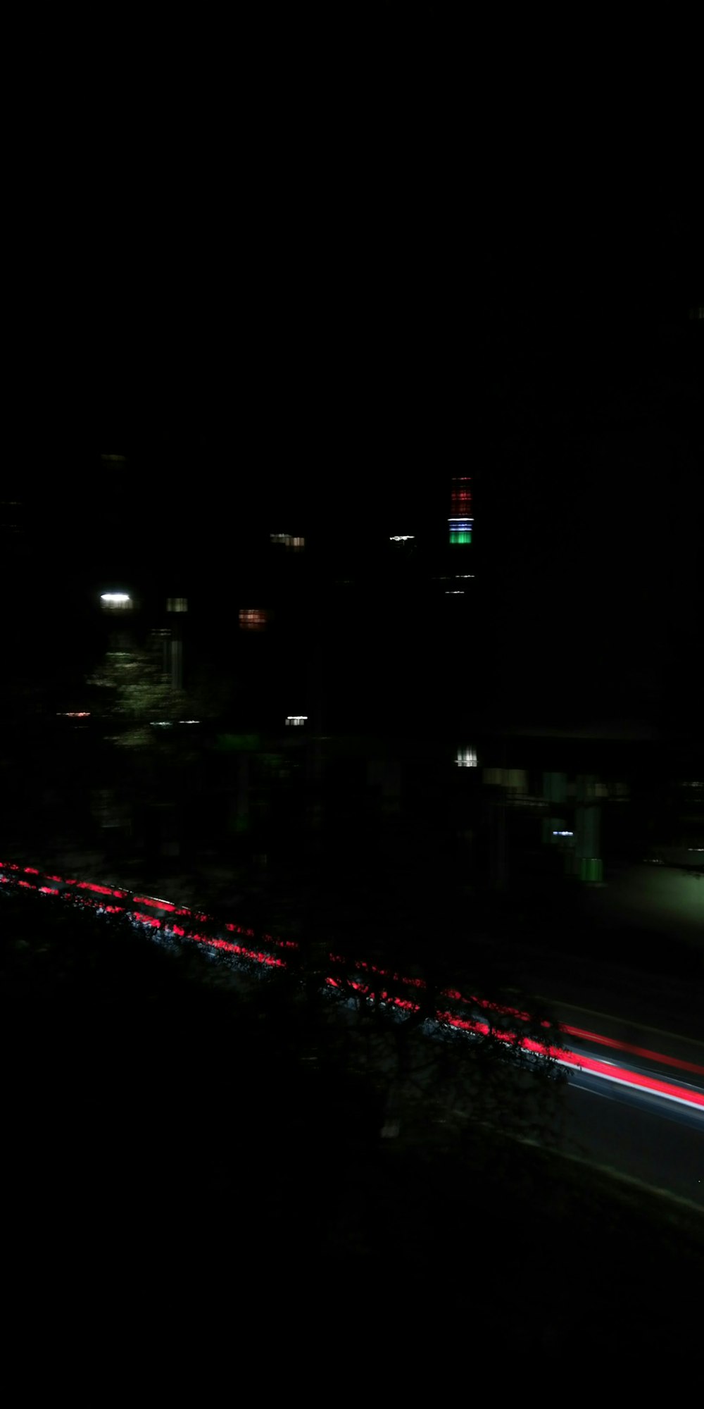 a blurry photo of a city at night