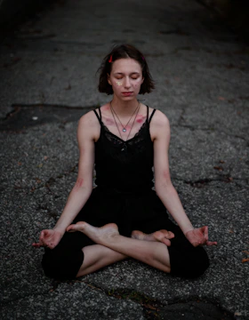 Instructor guiding a focused meditation training session.