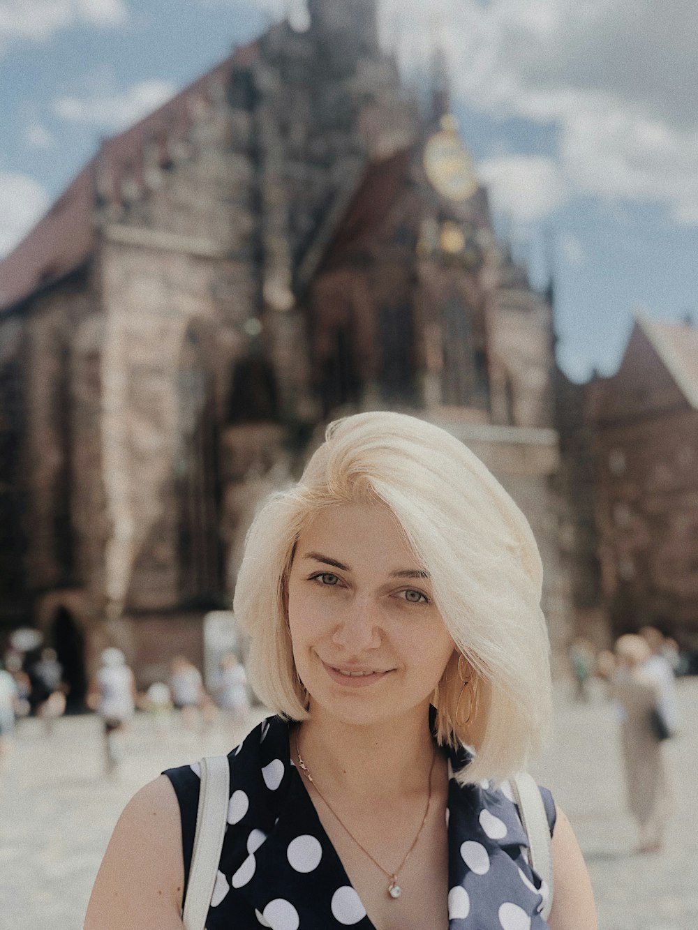 woman standing near buildings