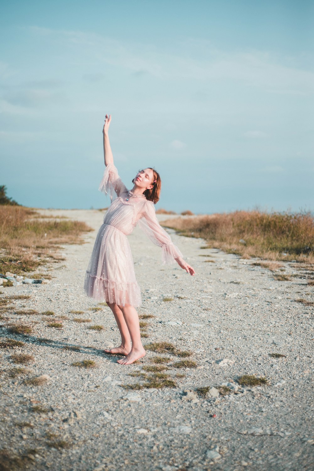 woman wearing pink dress