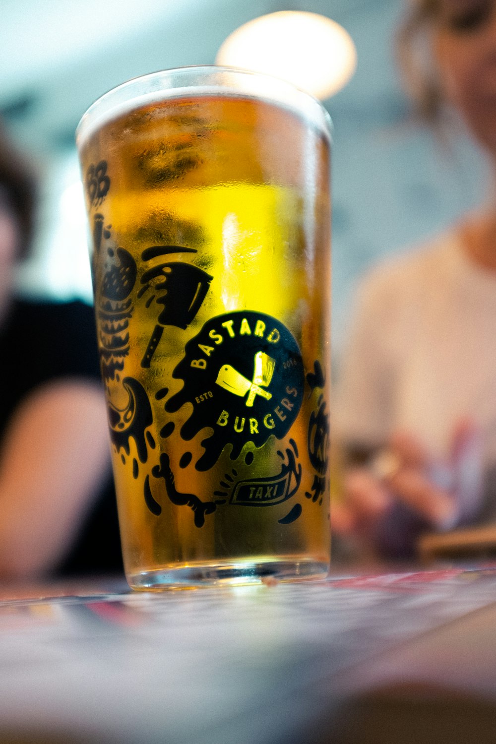 clear and black drinking glass with beer