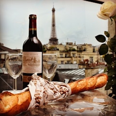 Baguette, wine, and view of the Eiffel Tower for a tasting and gastronomic tour in Paris