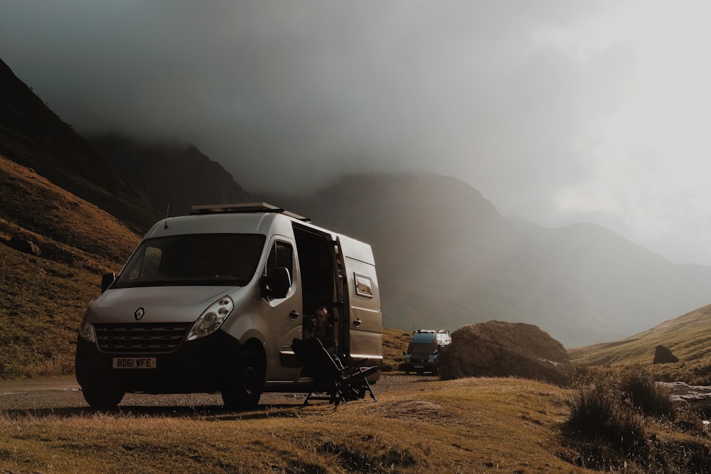 gray Renault van on hill