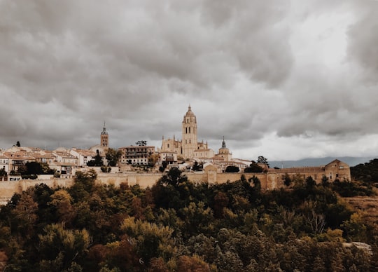 concrete buildings during daytime in Catedral de Segovia Spain