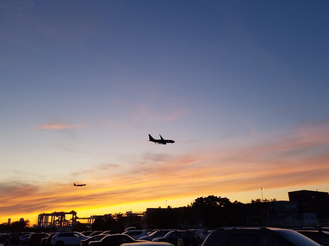 airplane under clear blue sky,