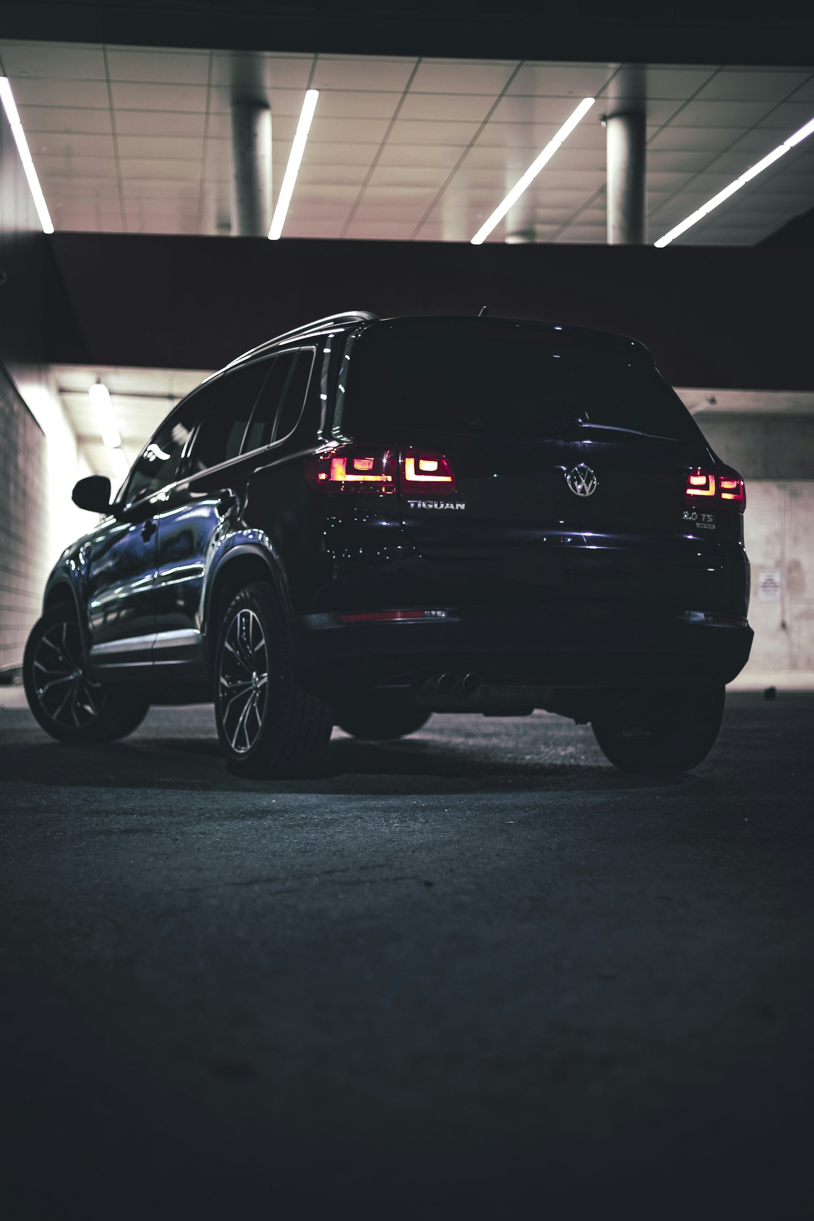 Canon EOS 6D Mark II + Canon EF 50mm F1.8 II sample photo. Black suv parking inside photography