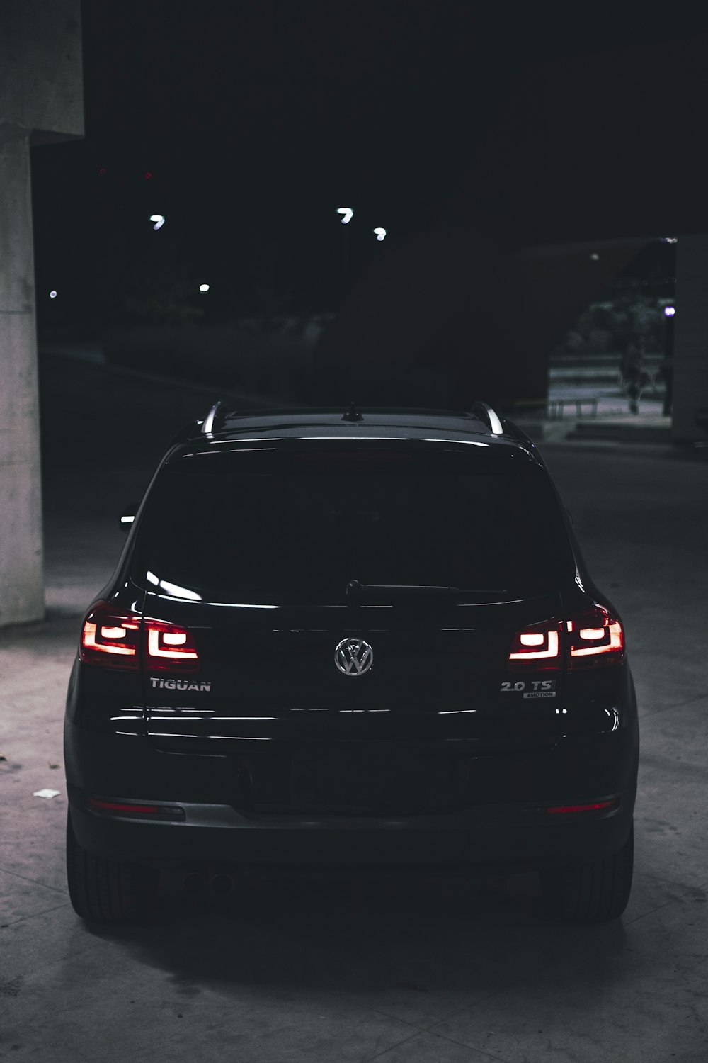 parked black Volkswagen car