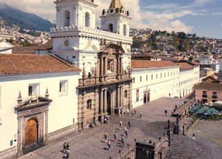 view of white and brown painted building at daytime