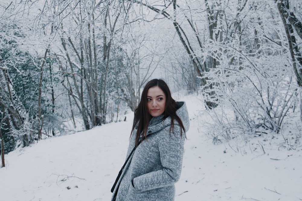 woman wearing grey coat