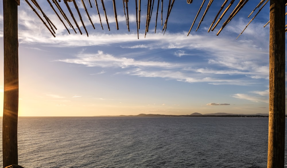 landscape photography of blue sea under cloudy sky during daytime