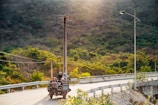 Passengers enjoying a breezy open-air ride through lush island trails