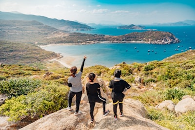 three women on mountain vacation teams background