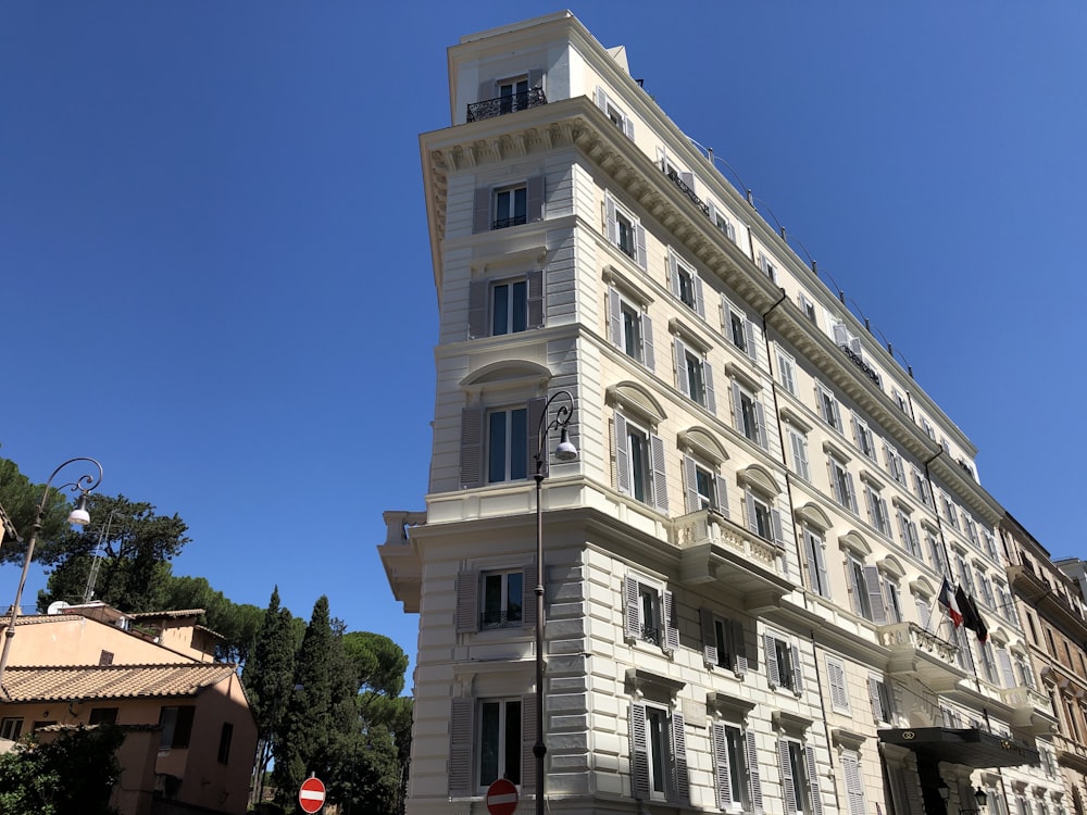 white concrete building under blue sky