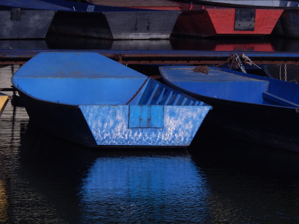 a couple of boats that are sitting in the water