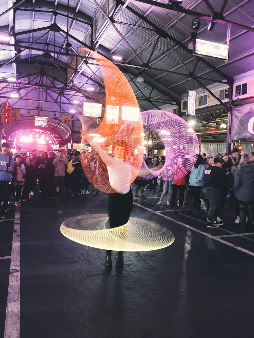 woman dancing in front of crowd