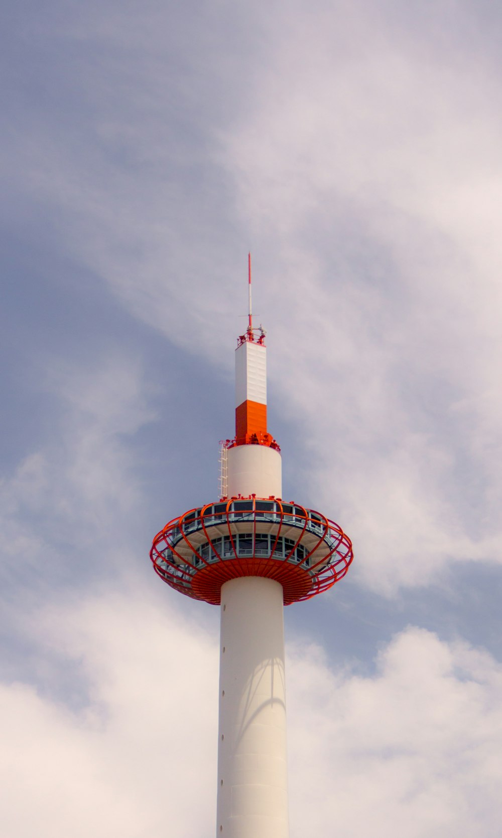 view of white and orange painted tower