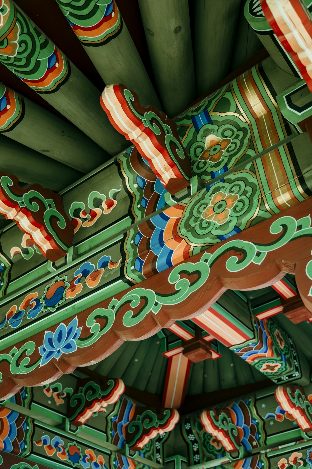 a close up of a colorfully painted roof