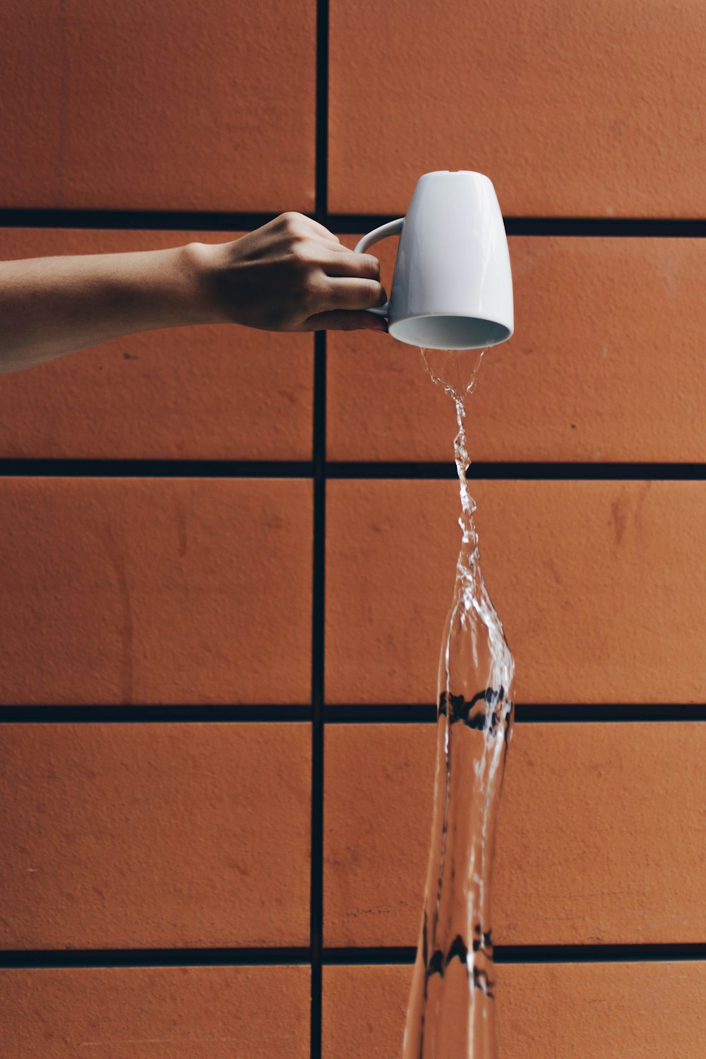 person pouring water