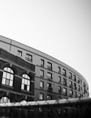 Black and white photo of the original MCES school building in Pune from the 1950s.