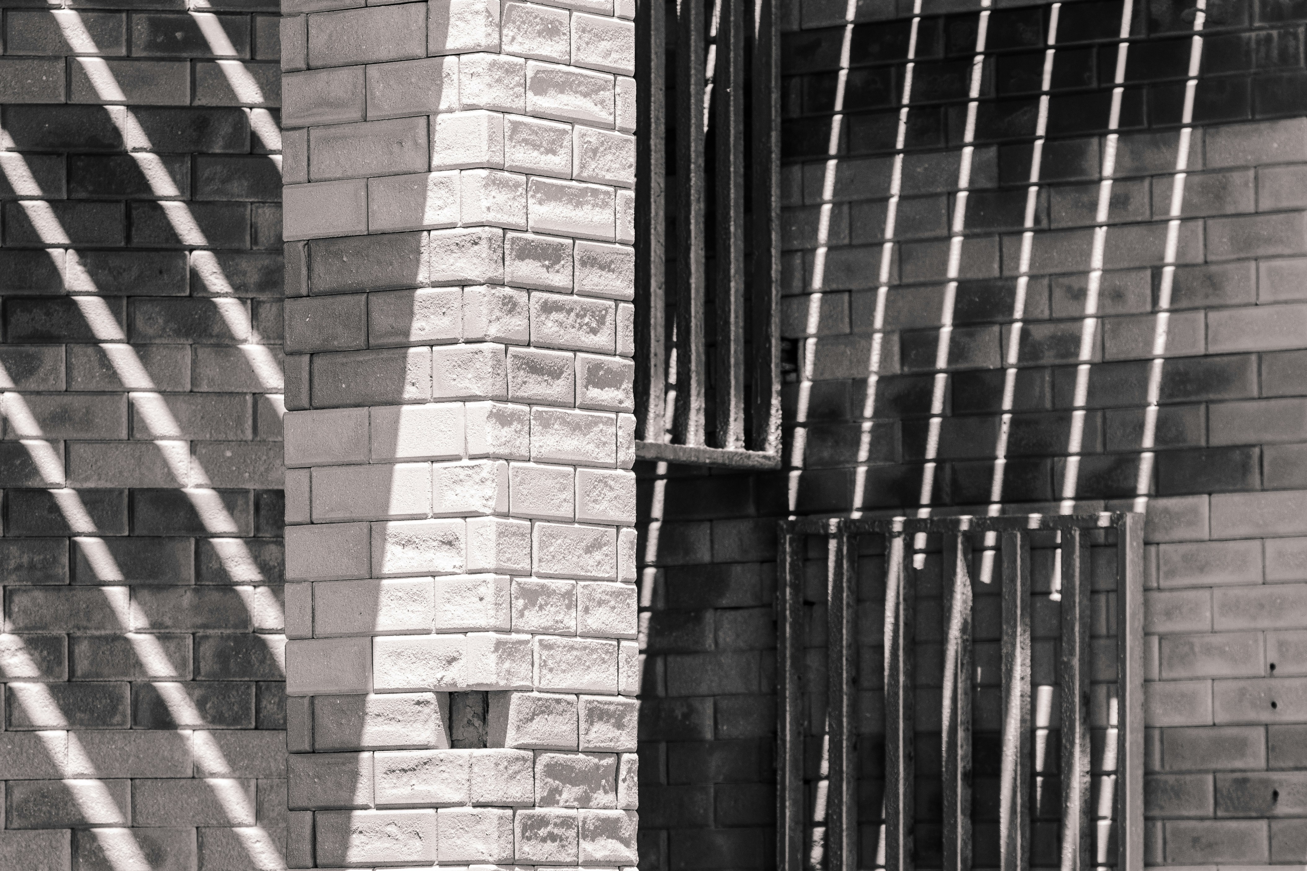 a black and white photo of a brick building