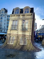 Satirical illustration of a government building melting like a candle.