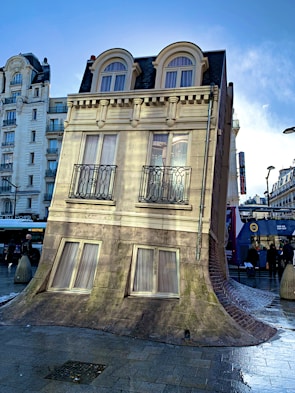 Satirical illustration of a government building melting like a candle.