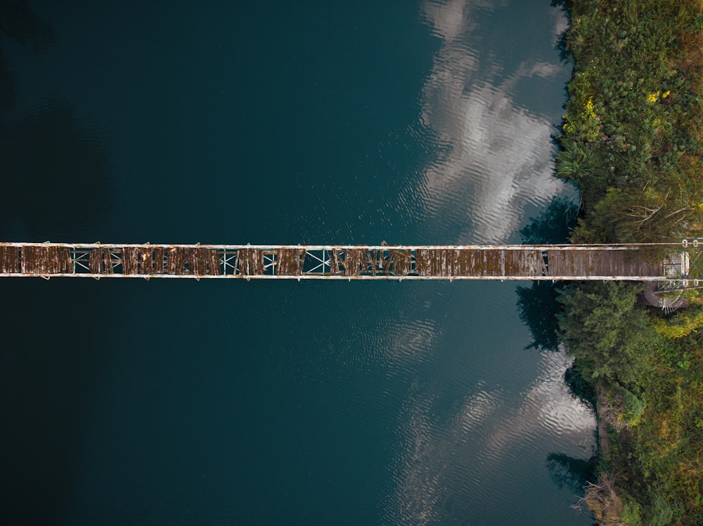 aerial view of broken hanging bridge