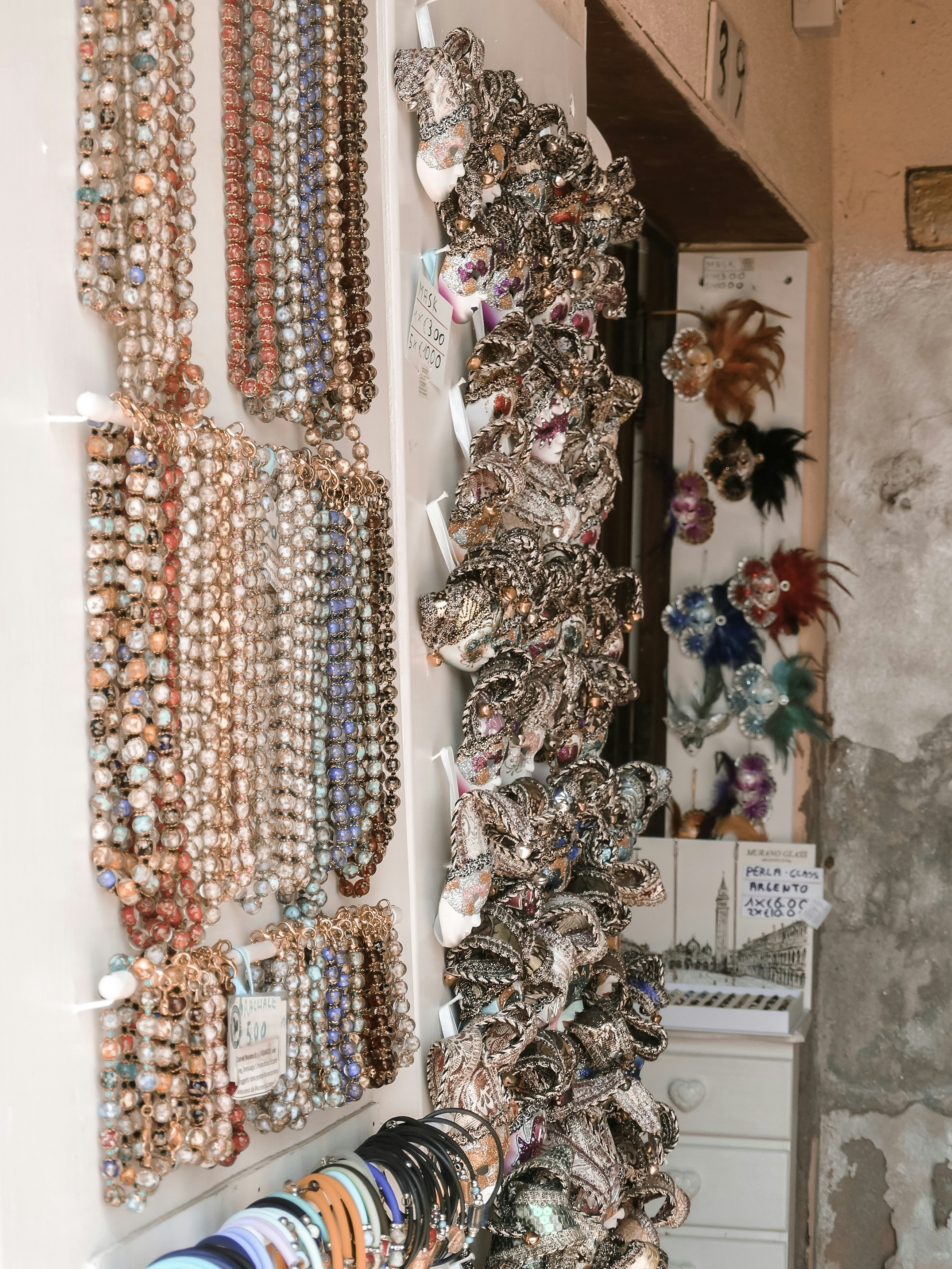 Various jewelry styles paired with different fashion outfits