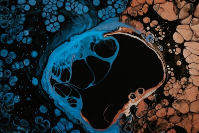an abstract painting of rocks and water