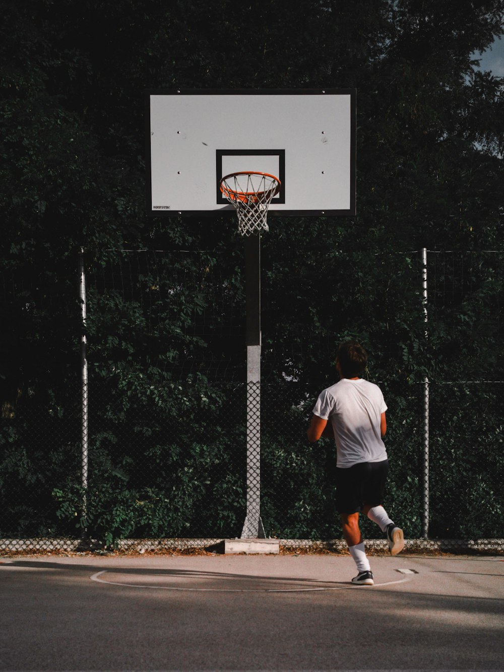 man playing basketball