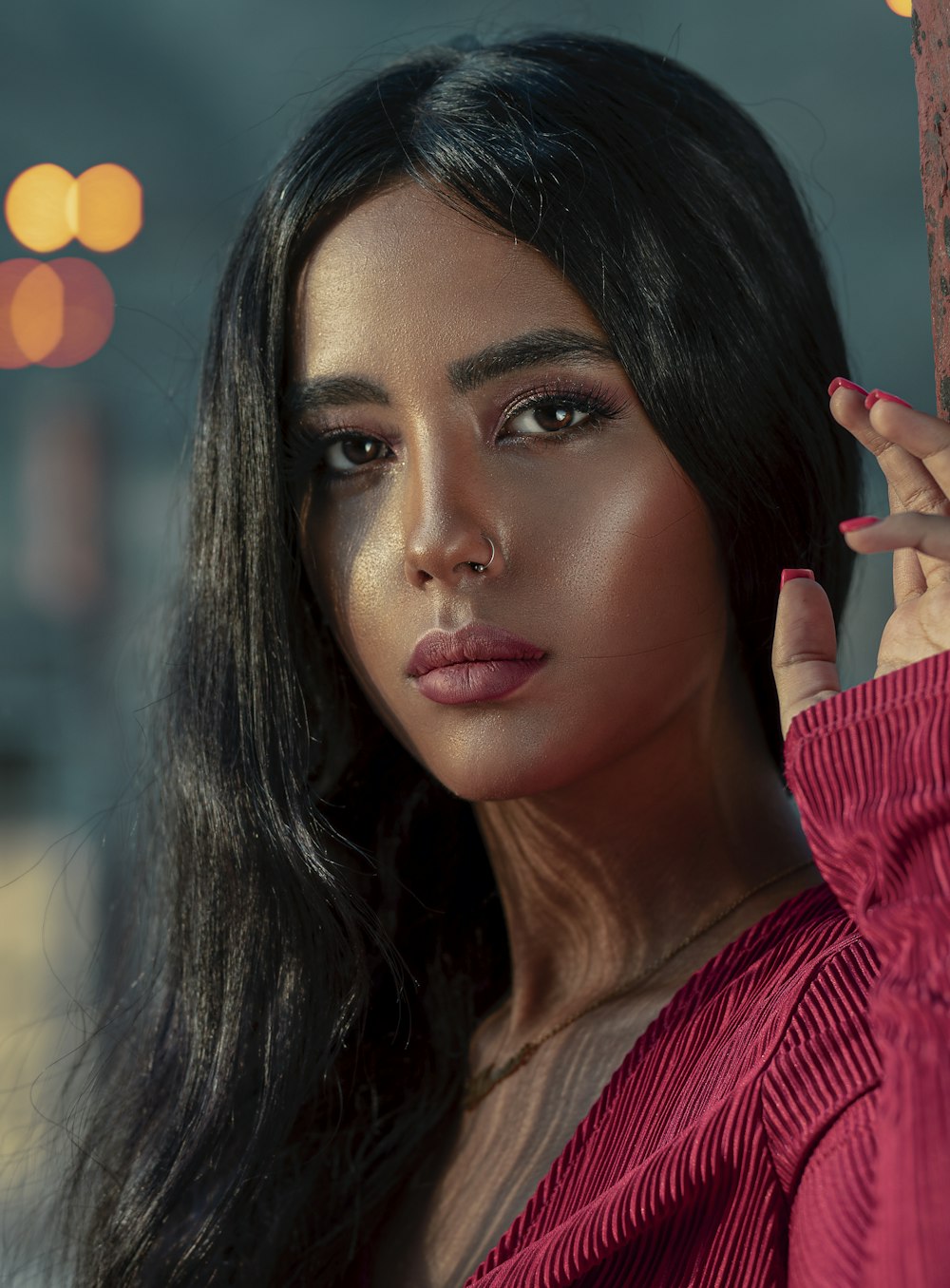 woman in red jacket