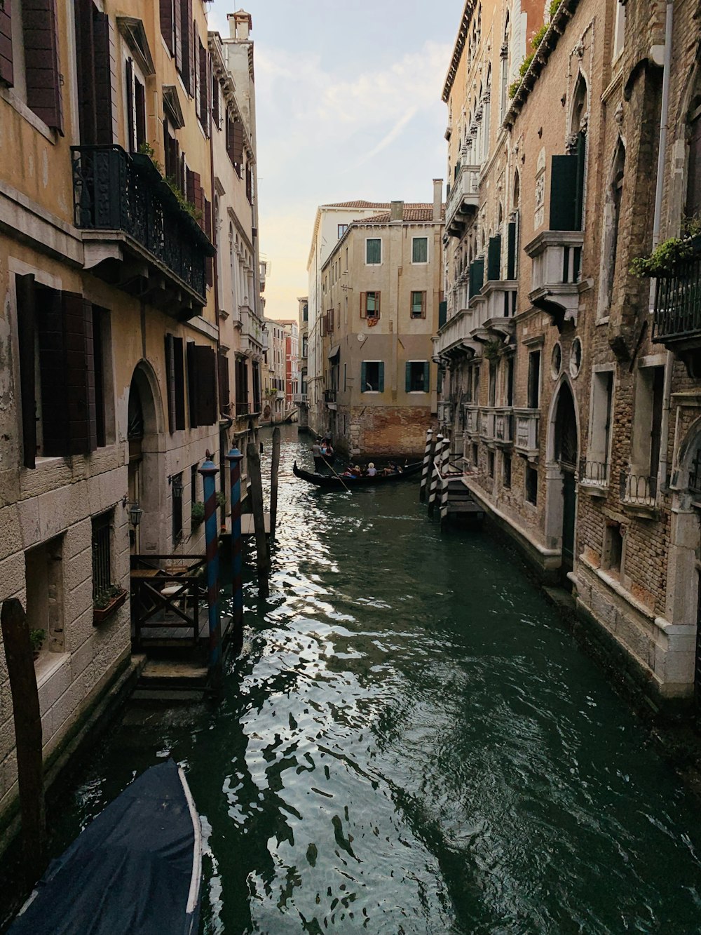 boats on canal during daytime