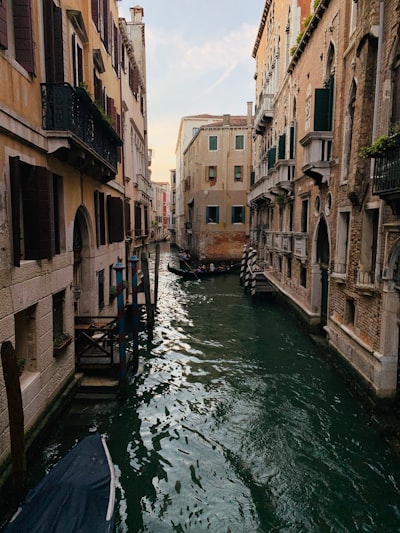 boats on canal during daytime