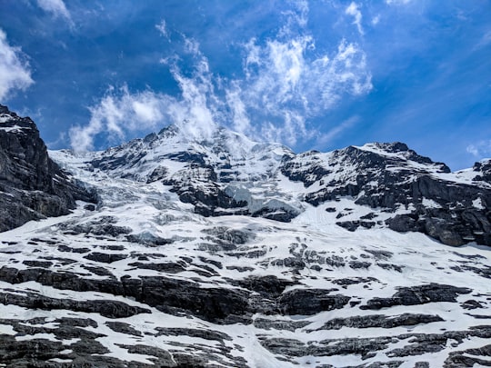 low-angle photography of mountain covered with snow in Eiger Glacier Switzerland