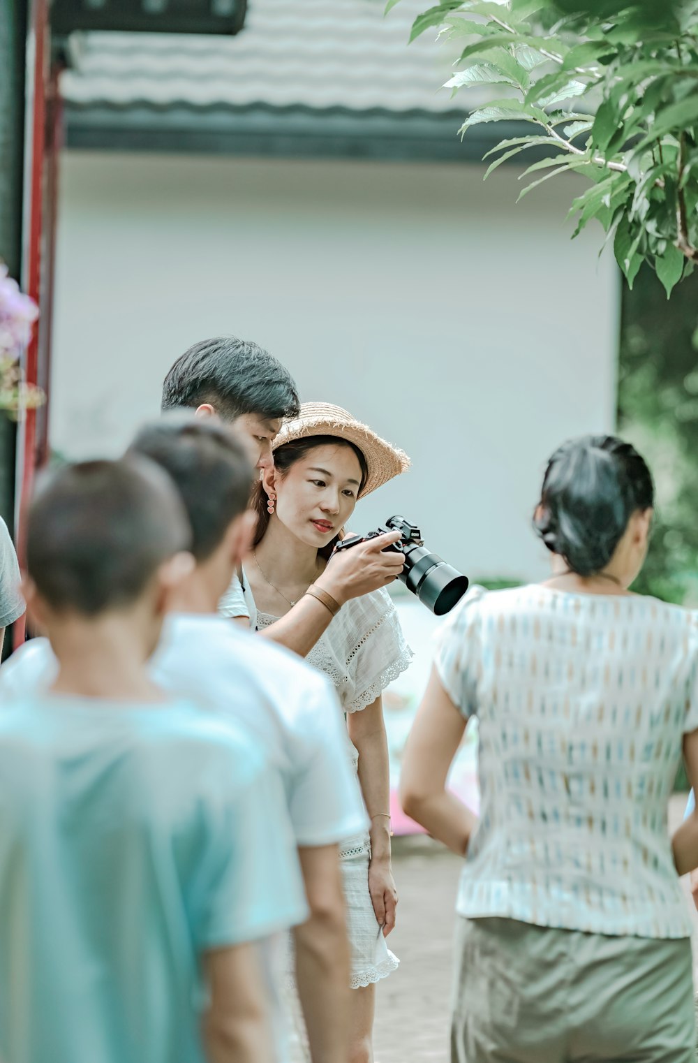 man holding DSLR camera