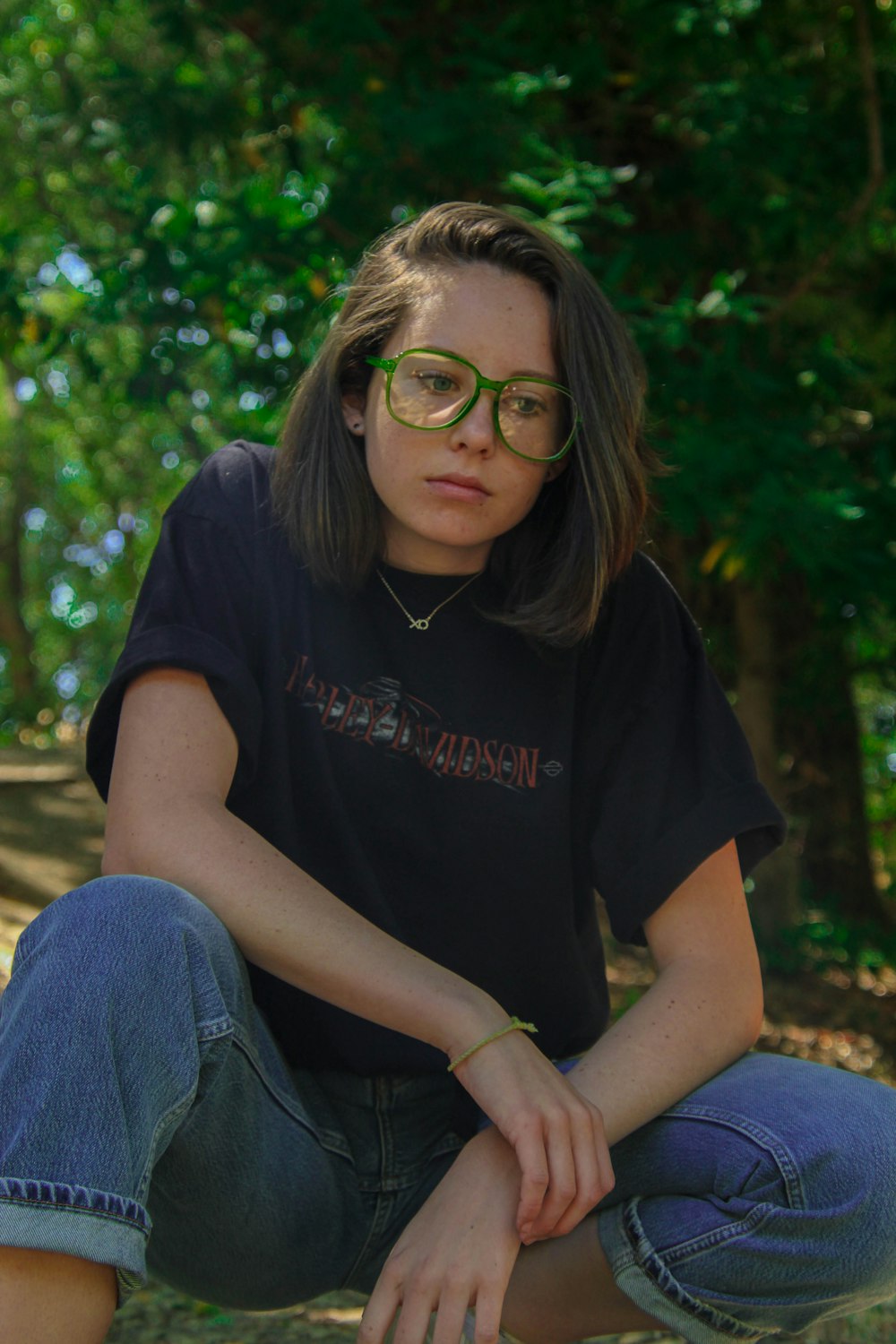 woman wearing black shirt and eyeglasses