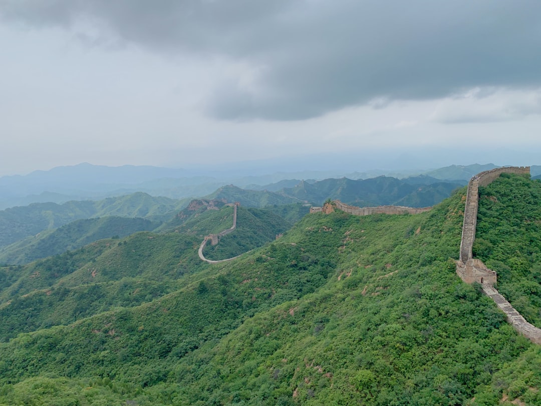 Great Wall of China under white clouds