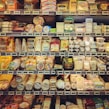 A selection of dairy products including milk, cheese, and yogurt on a kitchen counter.