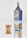 A tall, elegant bottle of whiskey with a blue label next to a glass filled with a brown liquid. The bottle features a gold cap and has branding and logos on its front.