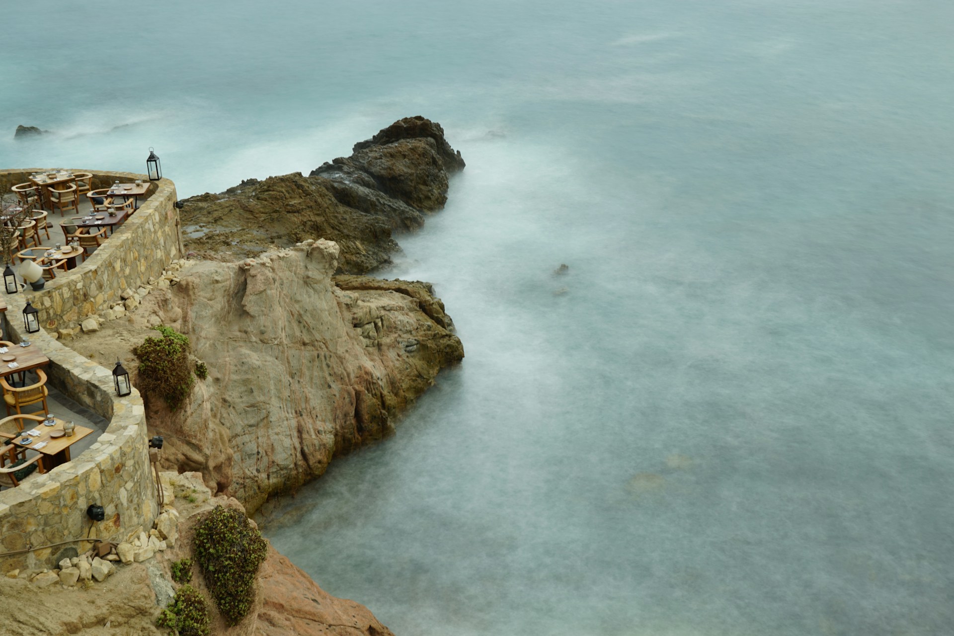 woman wearing yellow long-sleeved dress under white clouds and blue sky during daytime