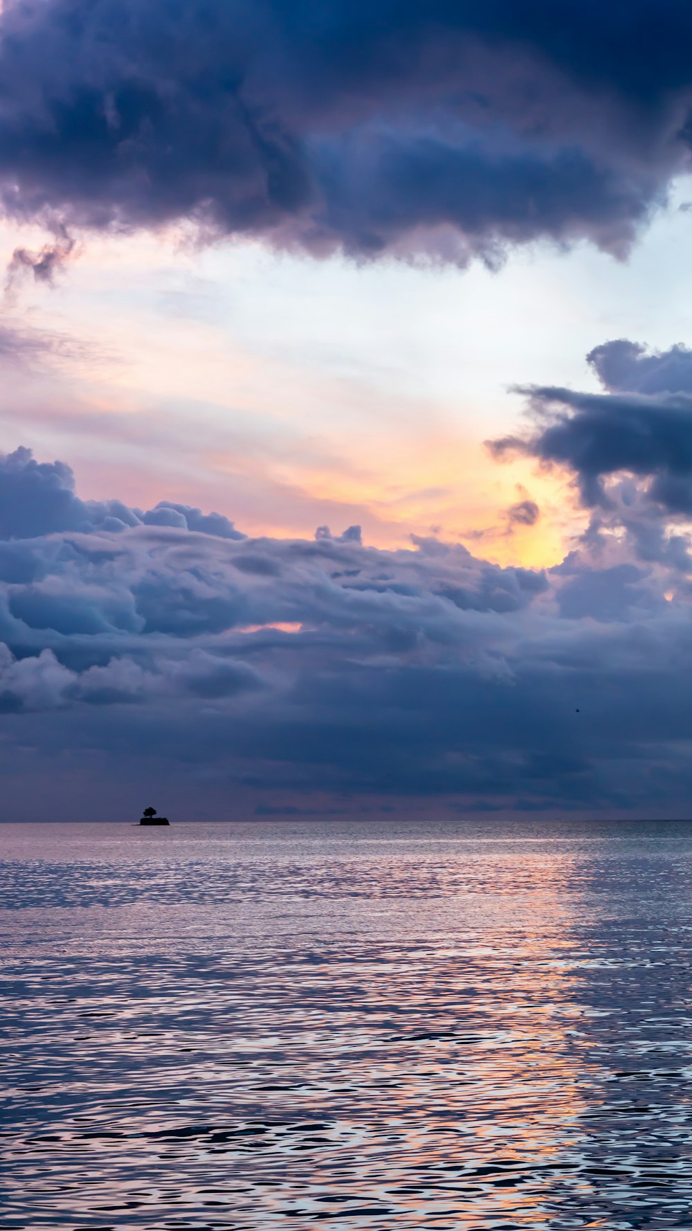 body of water and cloud