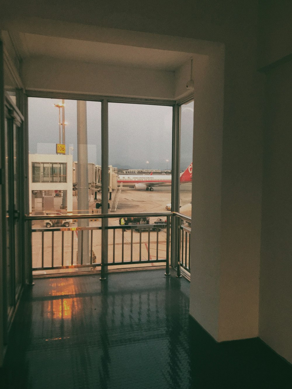 white and red airplane landing during daytime