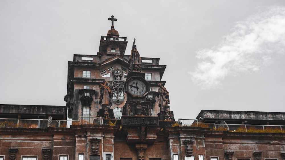 a large building with a clock on the top of it